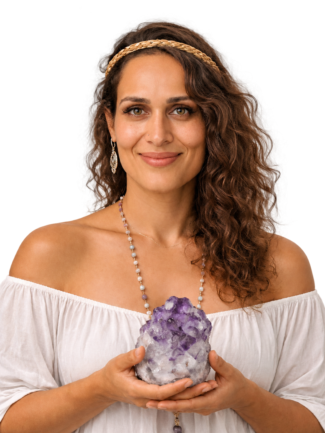 Reeya in a white top holding an amethyst crystal, with the background removed
